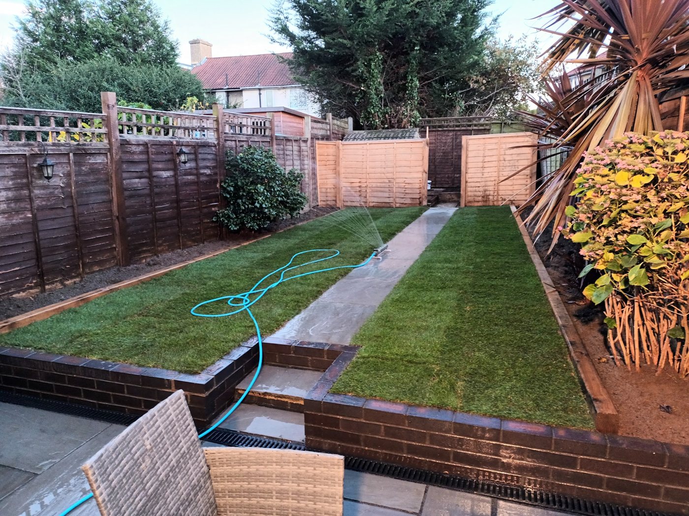 Freshly turfed lawn with new fencing in a Catford garden